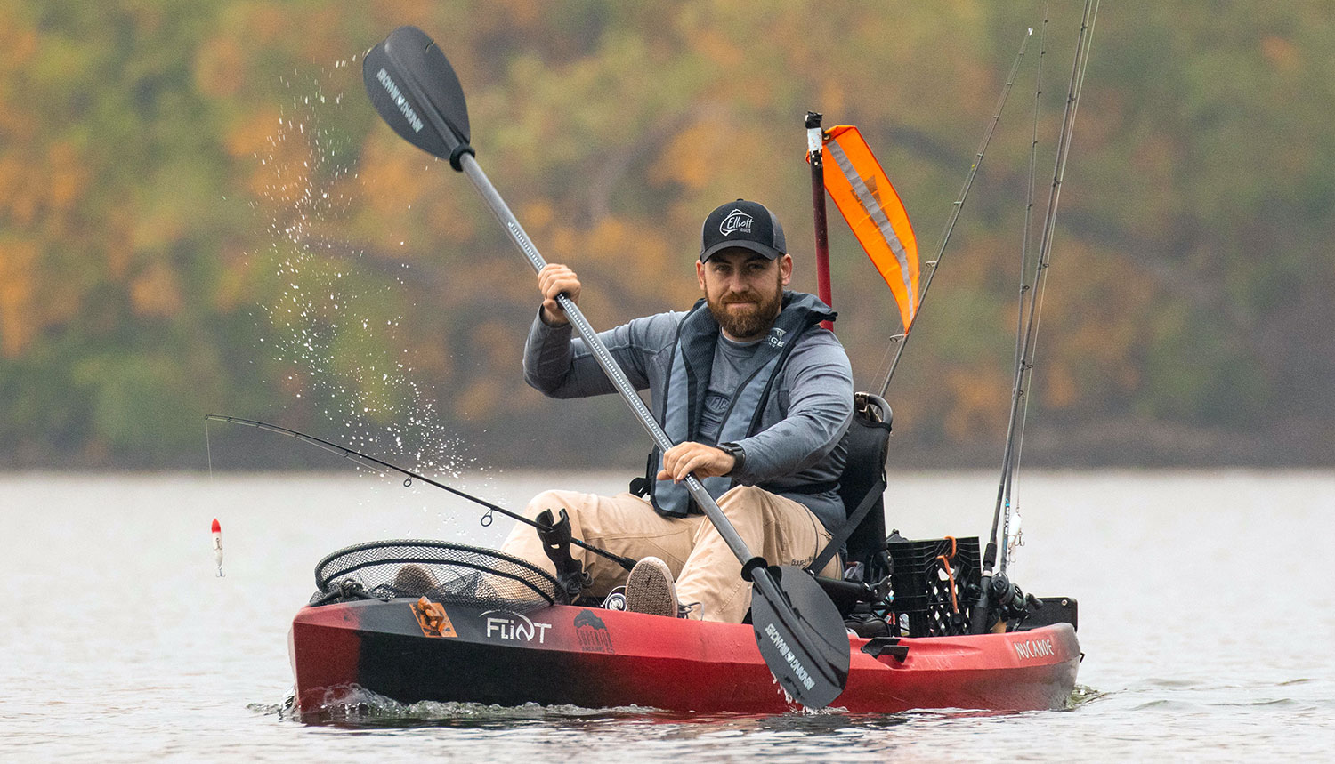 Man In Paddle Fishing Kayak