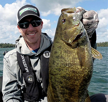 Eric-Scrivner-Holding-Smallmouth-Bass | Minnesota Kayak Fishing Association Eric Scrivner Holding Smallmouth Bass